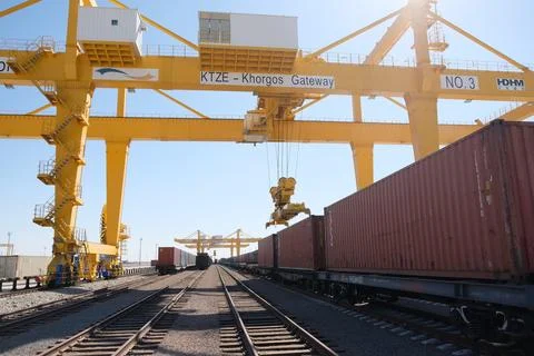 Unloading of containers at the station 스톡 사진