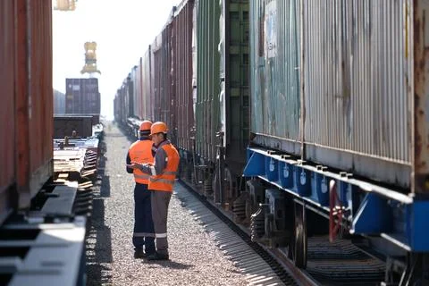 Unloading of containers at the station 스톡 사진