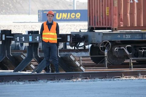 Unloading of containers at the station Photos