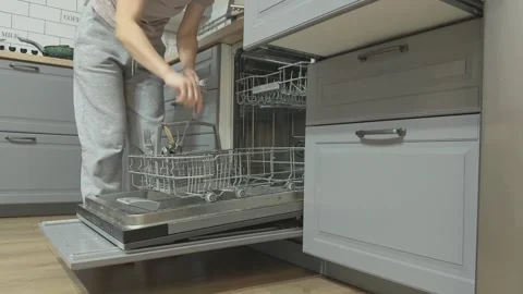 Unloading Dishwasher In Kitchen Routine, Concept Of Household Responsibility Vídeos de archivo 341866475
