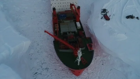 Unloading of large cargoes from a ship in Antarctica Stock Footage 119569970