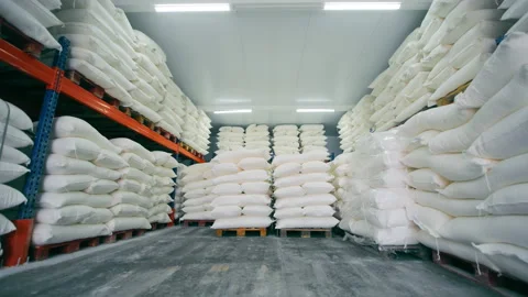 Unloading of large white bags from long-term storage of bulk products. Video stock 244385799
