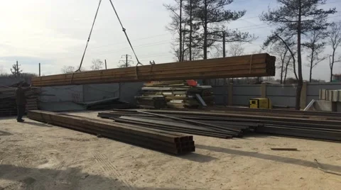Unloading the metal at the construction site Stock Footage 48196899