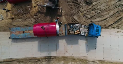 Unloading of metal pipe segment from truck Видео 141183289