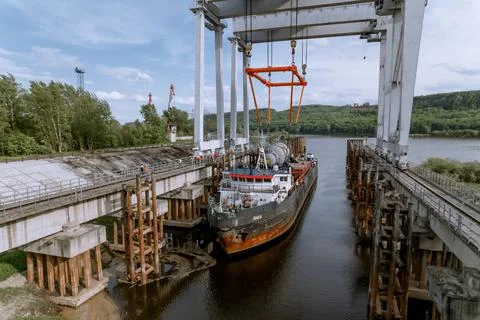 Unloading of the nuclear reactor at the port Stock Photos