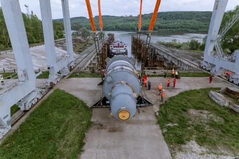 Unloading of the nuclear reactor at the port Stock Photos