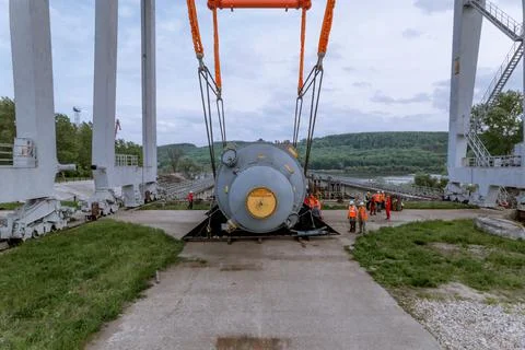 Unloading of the nuclear reactor at the port Stock Photos