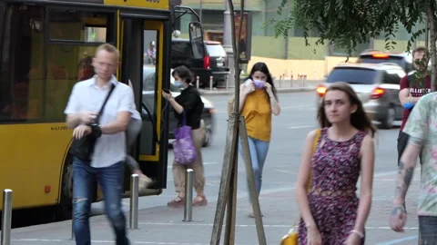 Unloading people - passengers from city vehicles - bus, - at a bus stop. Stock Footage