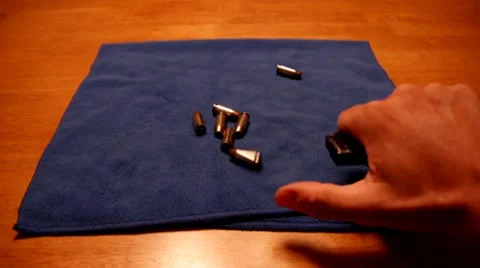 Unloading a pistol magazine Stock Footage 8647183