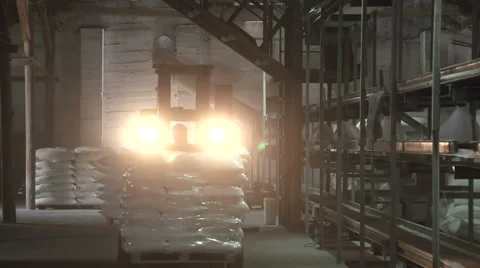 Unloading sacks of flour in a warehouse Stock Footage 60411606