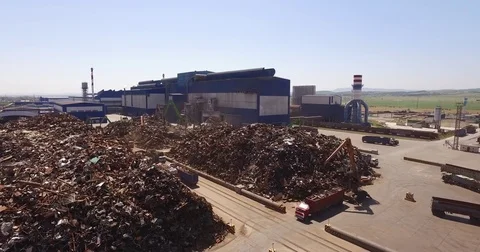 Unloading of scrap metal factory, view from above, cover shot Stock Footage 73184066