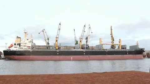 Unloading ship ir harbour port Stock Footage 10883114