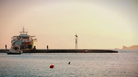 Unloading a small passenger ferry in the early morning at the pier. Stock Footage 252743791