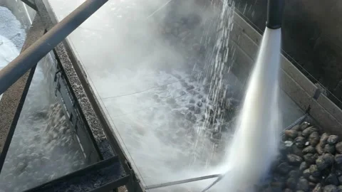 Unloading sugar beet with a jet of water from a truck trailer Stock Footage 166506106