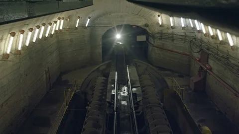 Unloading the train with coal in the mine Stock Footage 72656479