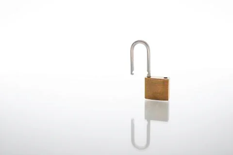 Unlocked and opened padlock as security or privacy concept, isolated on white Stock Photos
