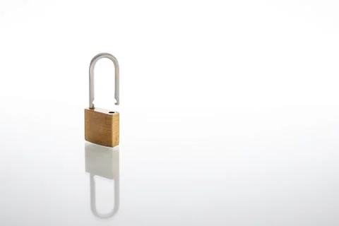 Unlocked and opened padlock as security or privacy concept, isolated on white Stock Photos