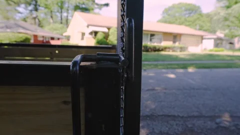 An unlocked trailer gate for towing large objects. Video stock 277627869