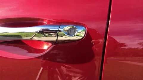 Unlocking Car Door in Sun Stock Footage 75799517