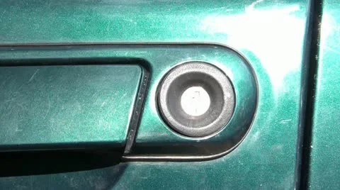 Unlocking Car Door in Sunlight Video stock 12615521