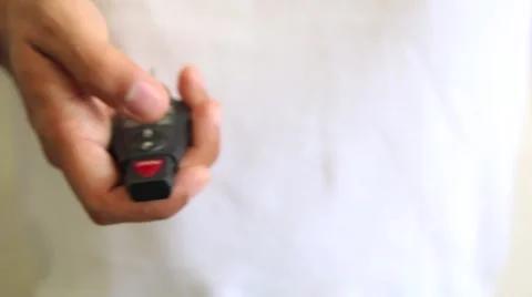 Unlocking a car key remote Stock Footage 49188215