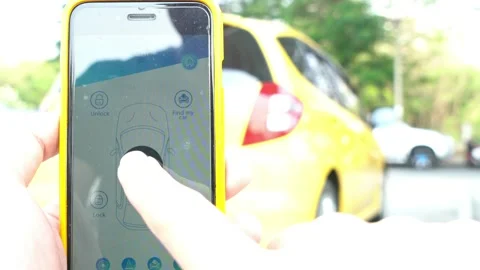 Unlocking a Car with Mobile App Technology Stock Footage 314666614