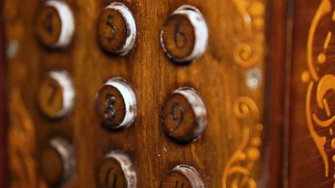 Unlocking combination on security lock close-up wooden box Stock Footage 96250379