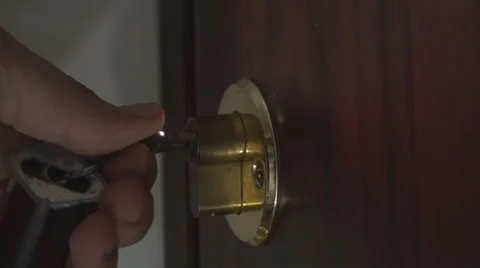Unlocking Door With A Key Close Up-Shot Stock Footage 35458064