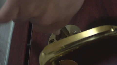 Unlocking Door With A Key Low Angle-Shot Stock Footage 35458088