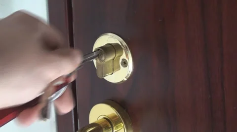 Unlocking Door With A Key Medium-Shot Stock Footage 35458150