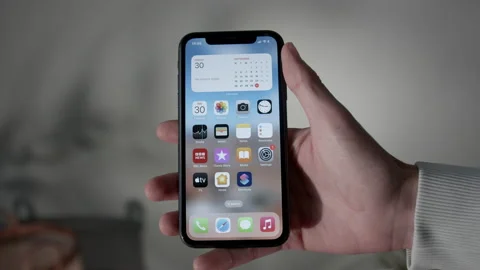 Unlocking iPhone with IOS 16 then putting it away, POV Stock Footage 217762488