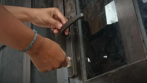 Unlocking a locked door Video stock 304425095