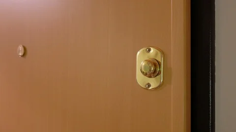 Unlocking the opening limiter and opening the armored door 库存影片 126921566