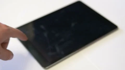 Unlocking The Tablet and Browsing Social Network Stock Footage 48574128