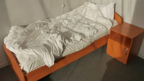 Unmade Bed in bright sunlight. Loop 1 Stock Footage 167213206