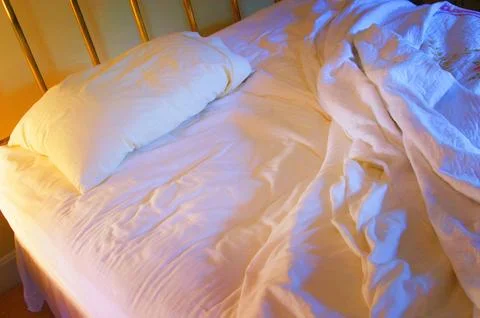 Unmade bed lonely Stock Photos