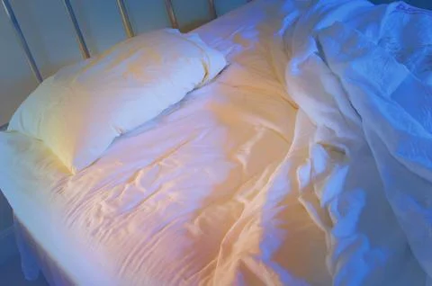 Unmade bed lonely Stock Photos