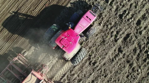 Unmanned tractor with a multifunctional sowing unit controlled remotely, working Stock Footage 165068344