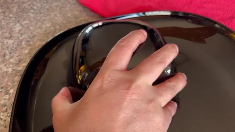 Unmolding Fluffy White Rice onto a Serving Plate for Jordanian Meal Stock Footage 344782249
