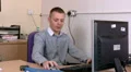 Unmotivated male at work HD Footage