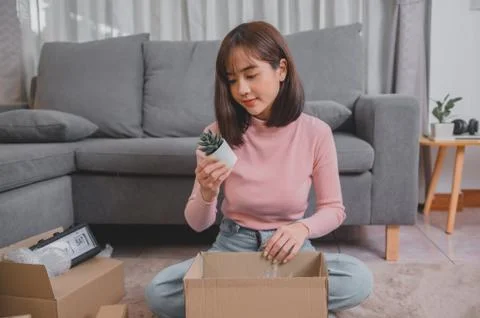 Unpack package and open parcel when online shopping and good delivery. Stock Photos