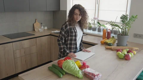 Unpacking Cutting Board From Drawer, Preparing To Cook With Fresh Groceries Stock Footage 306395259