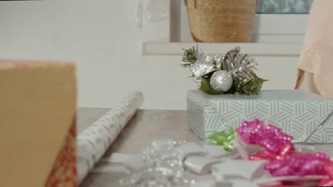 Unpacking decorative elements for gift wrapping Stock Footage 316820471