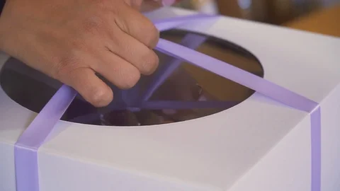 Unpacking the festive cake Stock Footage 91201205