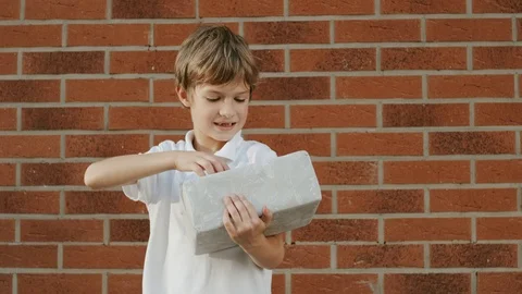 Unpacking Gift By A Boy. Video stock 101189392