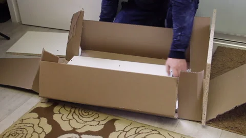 Unpacking the modular rack. The man open... | Stock Video | Pond5
