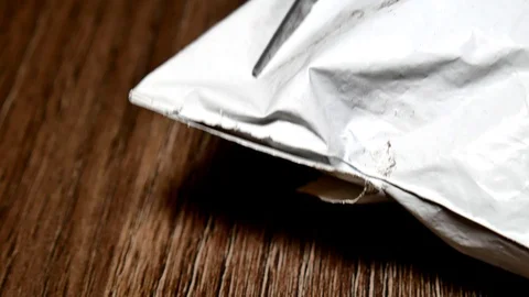 Unpacking parcel with scissors. Extreme close up. 動画素材 109387923