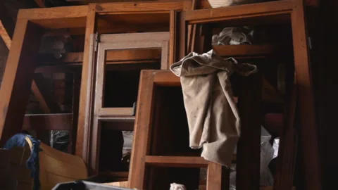 Unpainted wooden window frames in the attic Stock Footage 119978519
