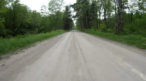 Unpaved road in forest Stock-Footage 7374151