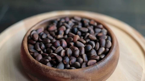 Unpeeled cedar nuts Stock Footage 127219694